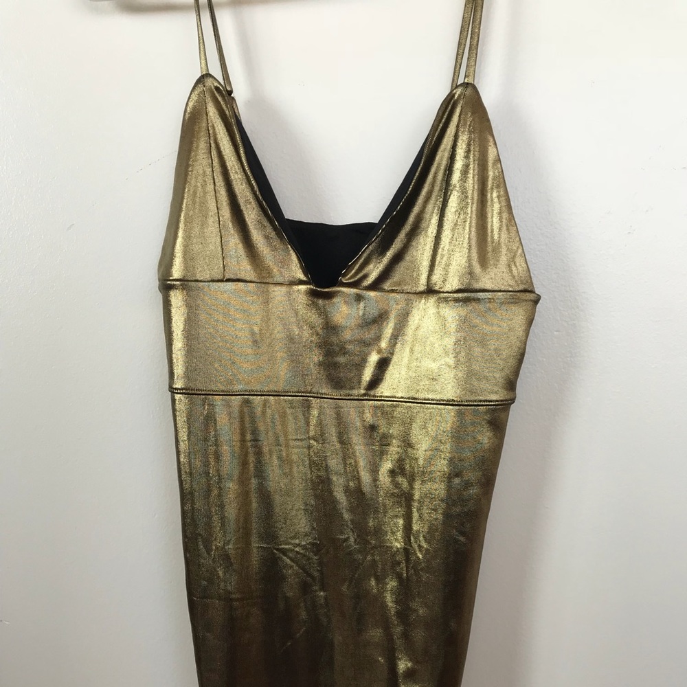 Metallic, gold free people mini dress. Never worn.